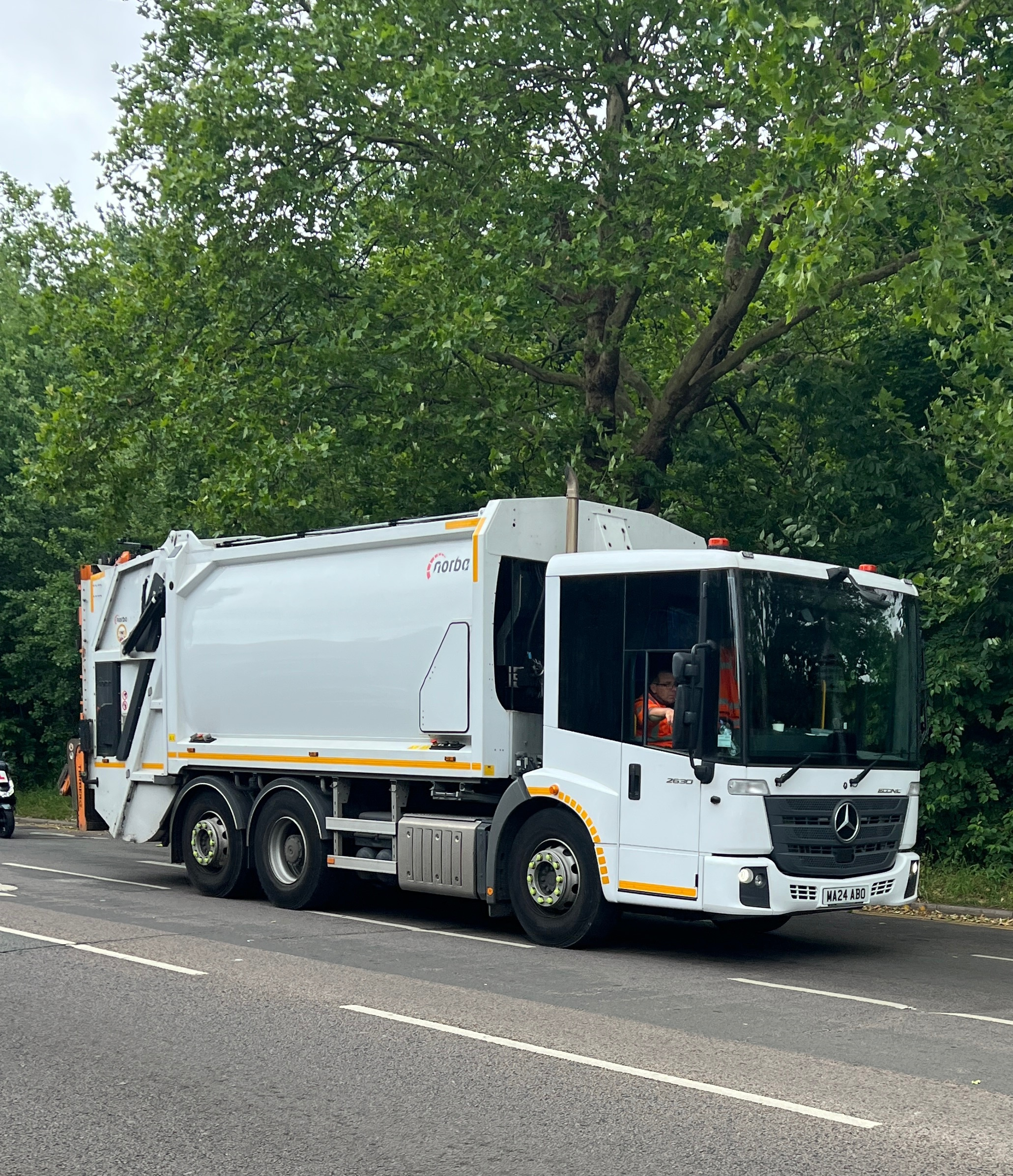 Waste management fleet optimization dashboard showing route planning and collection efficiency metrics